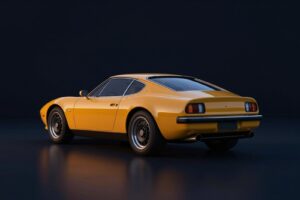 Sunset amber two-door sports coupé seen low from behind, in a dark showroom