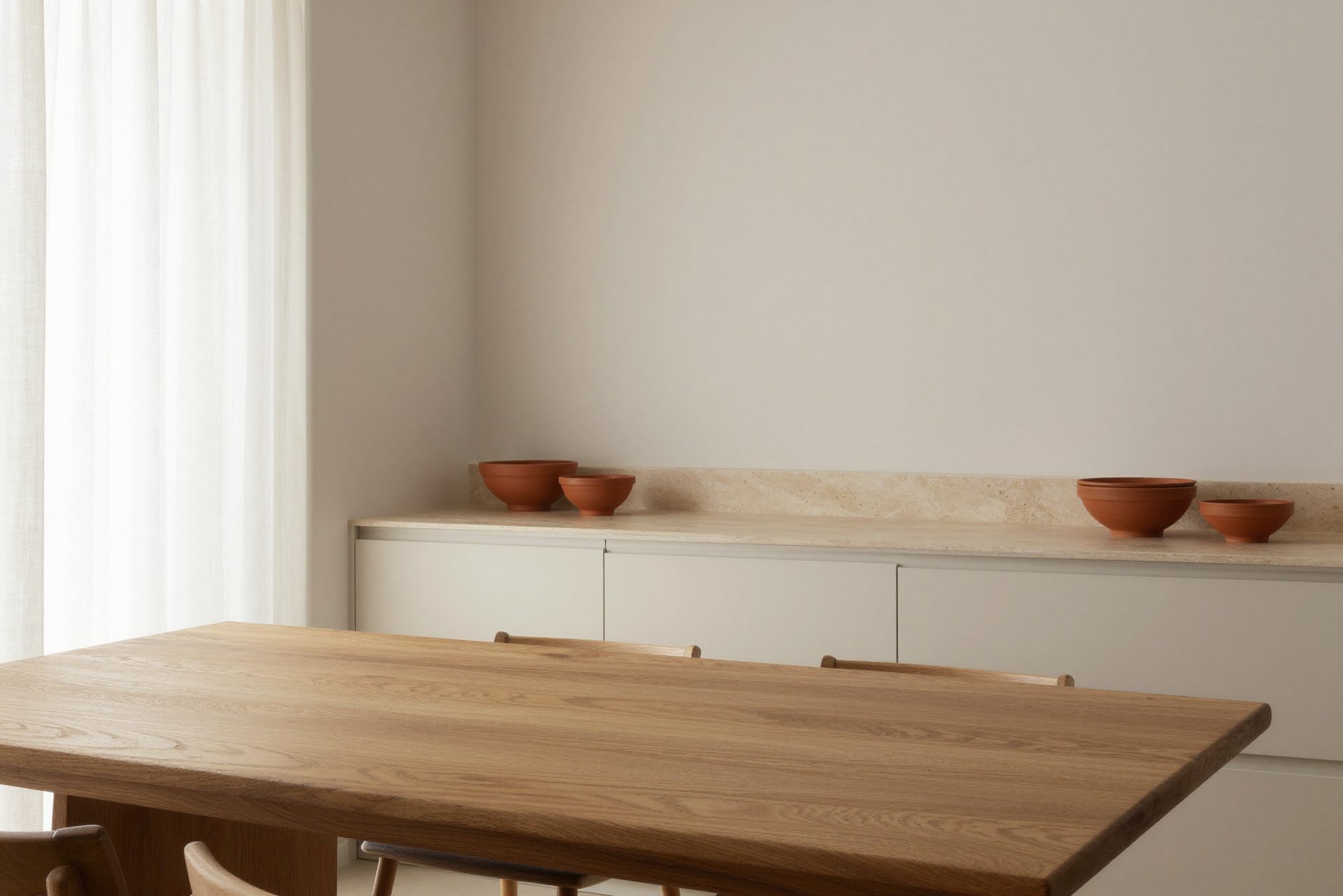 Modern kitchen with wooden dining table